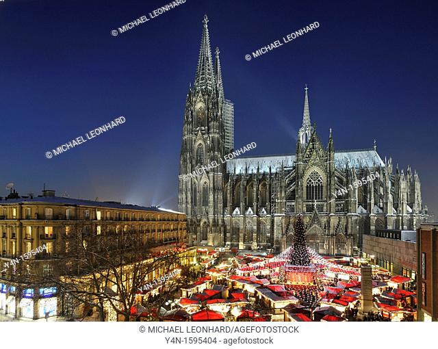 Christmans Market on Roncalli Place with Cathedral at Night, Cologne, Germany