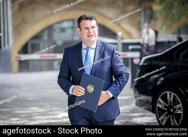 28 August 2023, Berlin: Hubertus Heil (SPD), Federal Minister of Labor and Social Affairs, comes to the press conference to present the coalition's agreement on...