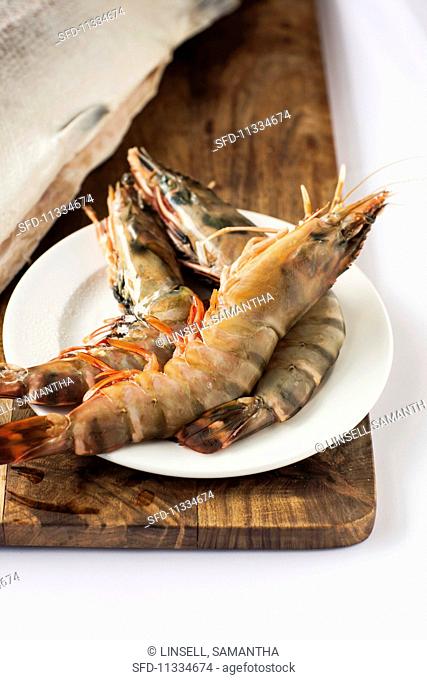 Raw king prawns on a plate