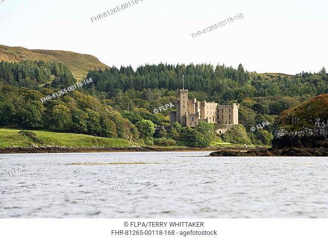 View of castle and saltwater loch, Dunvegan Castle, Loch Dunvegan, Isle of Skye, Inner Hebrides, Scotland
