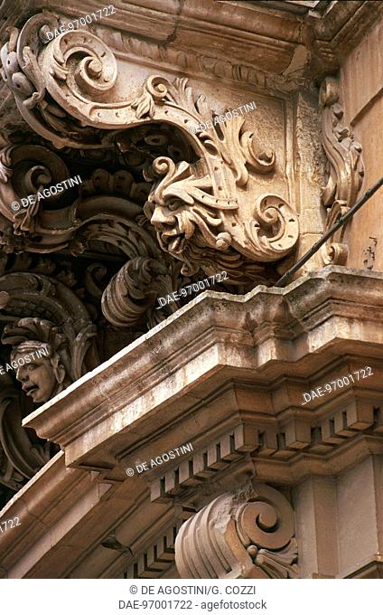 Sculptural decoration with mascarons, balcony of the Manenti Palace, Modica, Ragusa, Sicily, Italy, 18th century, detail