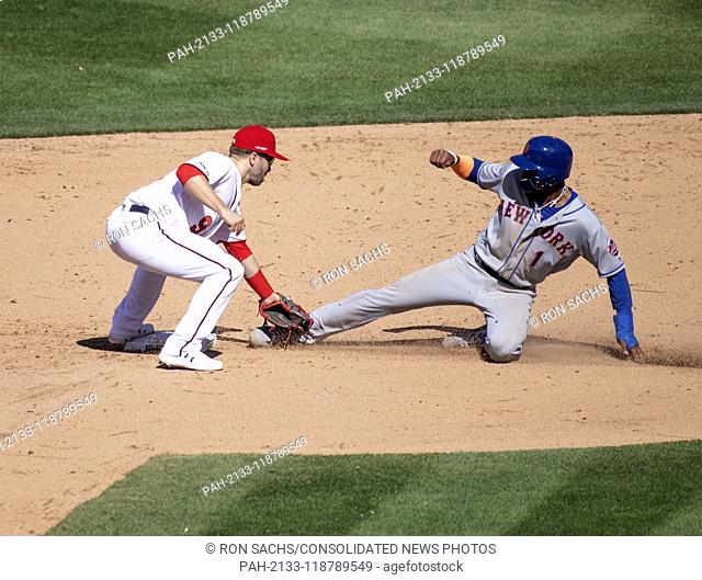 New York Mets shortstop Amed Rosario (1) is tagged out by Washington Nationals second baseman Brian Dozier (9) as he attempts to steal second base in the eighth...