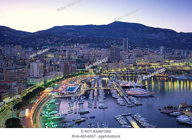 The marina, waterfront and town of Monte Carlo in the evening, Monaco, Mediterranean, Europe