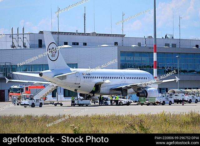 PRODUCTION - 04 August 2022, Hessen, Calden: An airplane of the airline Sund-Air stands at Kassel Airport. Staff shortages, strikes