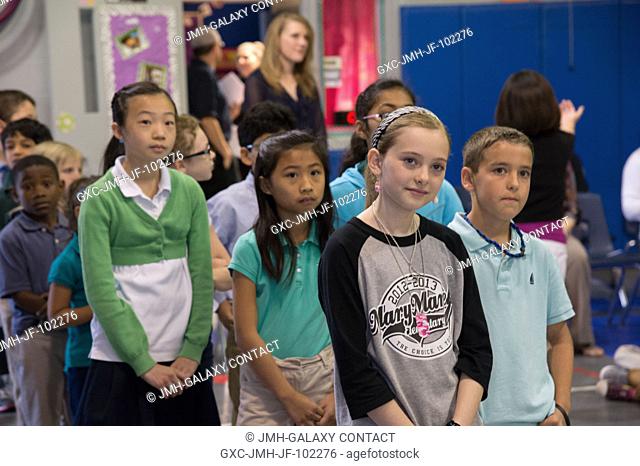 Grace Marshburn, second right, daughter of NASA astronaut Tom Marshburn, and other students at Mary Marek Elementary School in Pearland