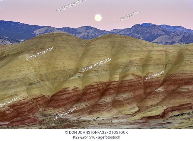 Moonrise over the exposed laterite sediments in the Painted Hills, John Day Fossil Beds National Monument, Painted Hills Unit, Mitchell, Oregon, USA