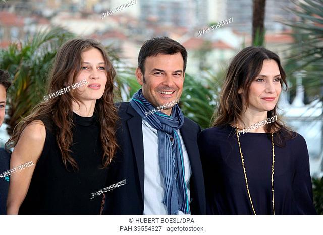 French actress Marine Vacth (L), French director Francois Ozon (C) and French actress Geraldine Pailhas pose during the photocall for 'Jeune & Jolie' (Young &...
