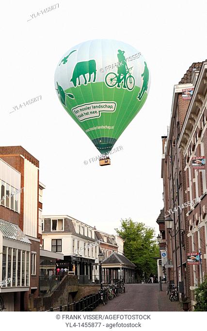 Balloon above the city of Amersfoort advertising for a nicer landscape, Netherlands