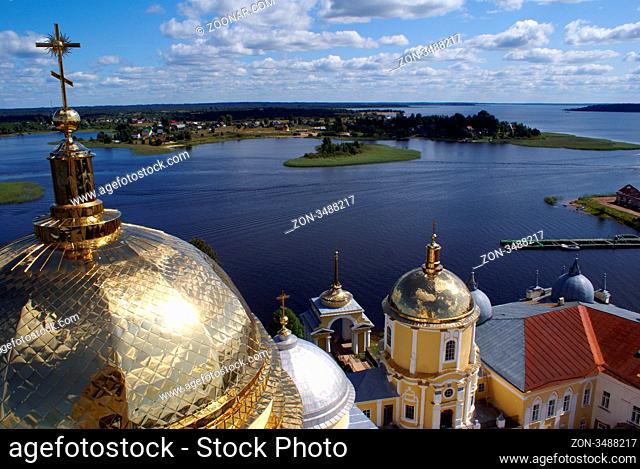 Golden cupola and monastery Nilova Pustyn, Seliger region, Russia
