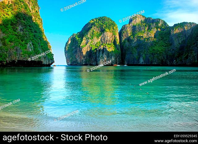 Maya Bay surrounded by limestone cliffs on Phi Phi Leh Island, Krabi Province, Thailand. It is part of Mu Ko Phi Phi National Park