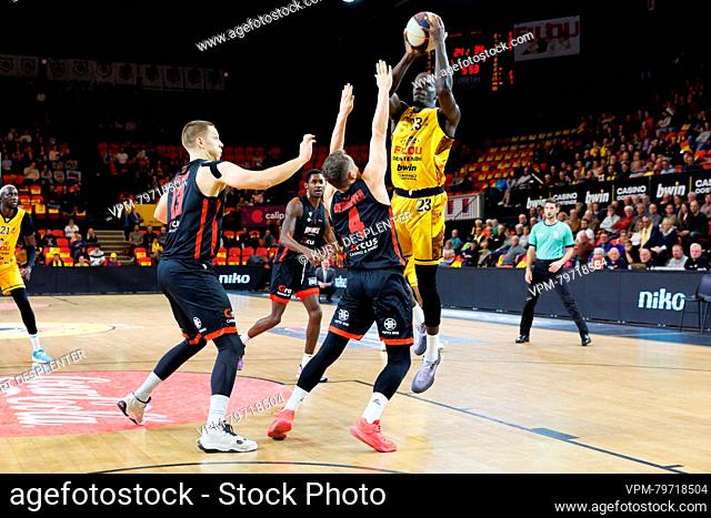 Brussels' Terry Deroover and Oostende's Damien Jefferson fight for the ball during a basketball match between BC Oostende and Brussels Basketball