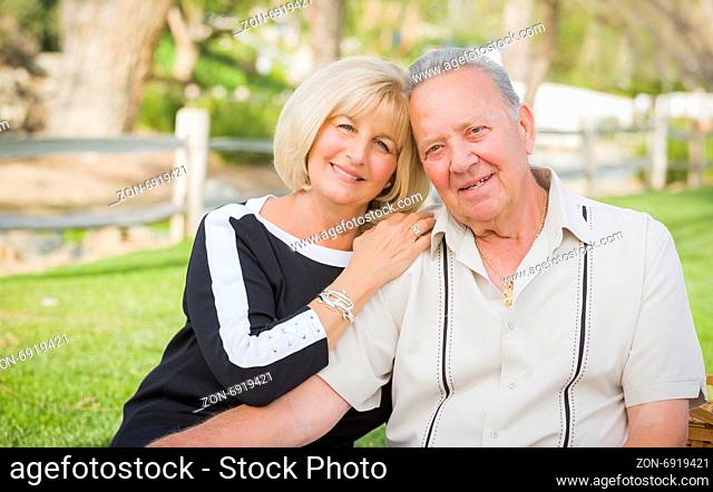 Affectionate Senior Couple Portrait Outside At The Park