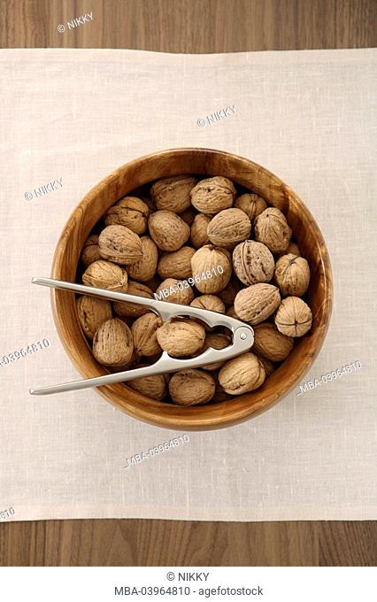 Nuts, peel, nutcrackers, tablecloth
