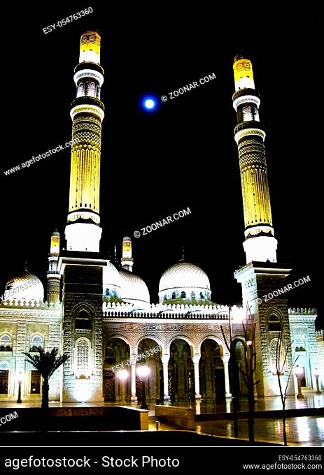 Saleh mosque in the night backlight with full moon, Sanaa, Yemen