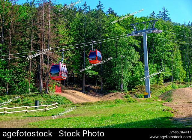 Red cable cars of mountain cableway in Maribor, Pohorska vzpenjaca in Slovenia