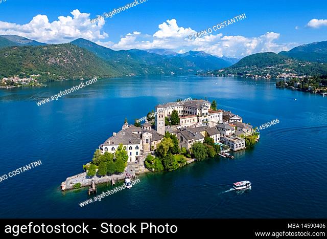 Aerial view of Isola di San Giulio on Lake Orta in the summer. Orta Lake, Province of Novara, Piedmont, Italy