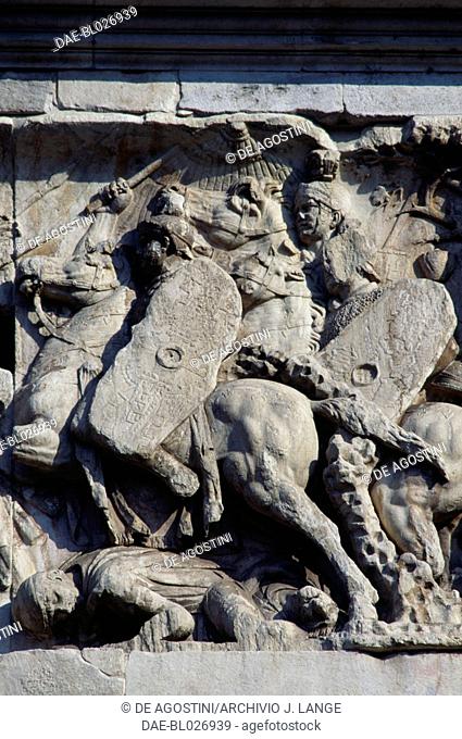 Bas-relief depicting the Roman cavalry charge commanded by the Emperor Trajan against the barbarians who are retreating, detail, Arch of Constantine, 315 AD