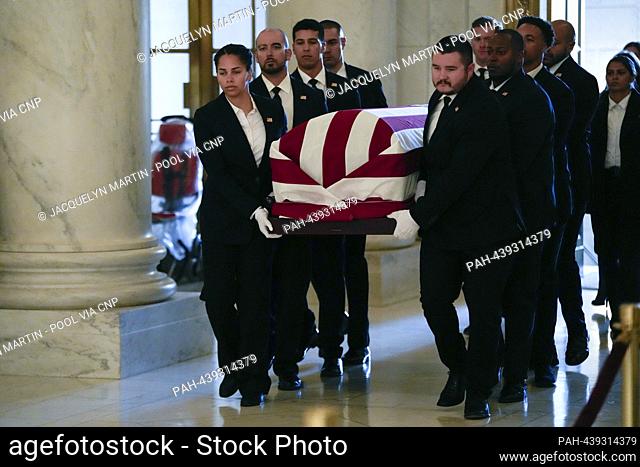The flag-draped casket of former Associate Justice of the Supreme Court Sandra Day O'Connor, carried by US Supreme Court Police officers