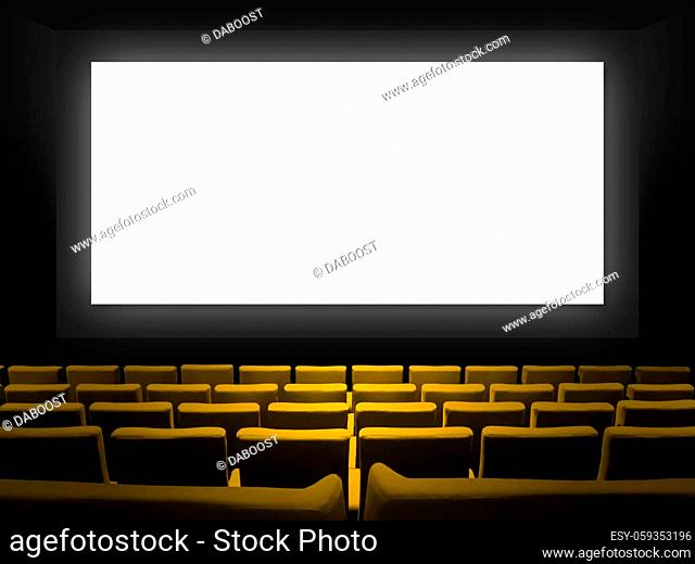 Cinema movie theatre with yellow velvet seats and a blank white screen. Copy space background