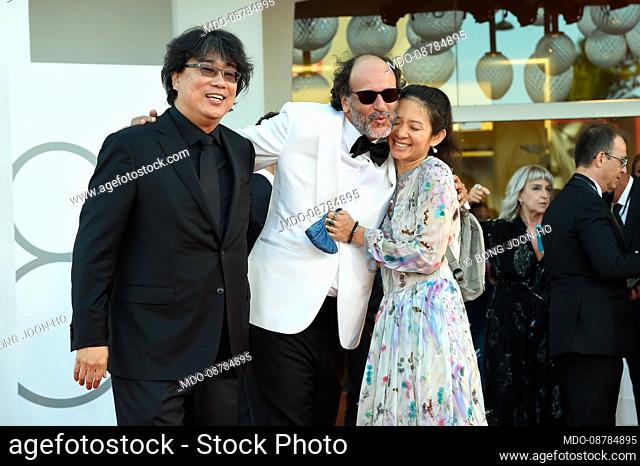 Directors Bong Joon-ho, Luca Guadagnino, Chloè Zhao at the 78 Venice International Film Festival 2021. Madres Paralelas red carpet and Opening cerimony