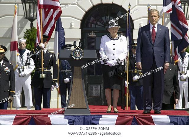 President George W. Bush and Queen Elizabeth II standing at attention during the National Anthem on the South Lawn of the White House for the May 7
