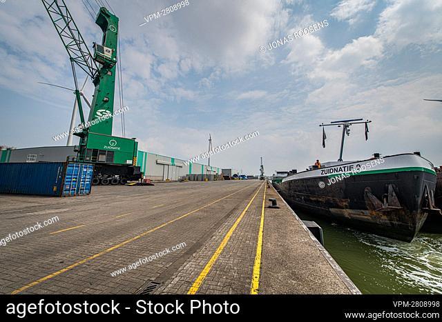 Illustration shows a barge moored at Zuidnatie, logistics and warehousing specialist, company plant in Antwerp harbor, Thursday 03 June 2021