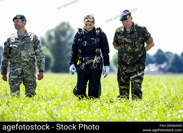 Dutch Queen Maxima during a tandem parachute jump with paratroopers at the Defense Para School, DPS, at the Breda International Airport (former Seppe) in Breda