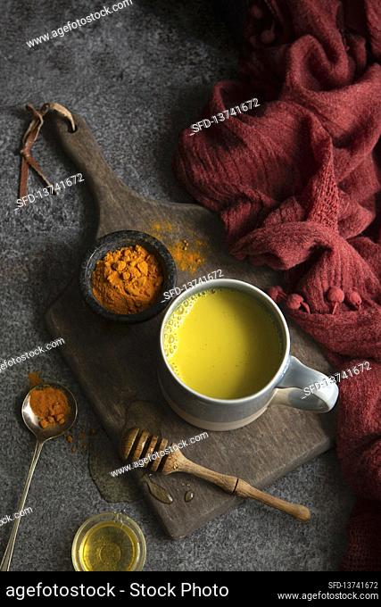 Turmeric latte made with cashew milk with honey