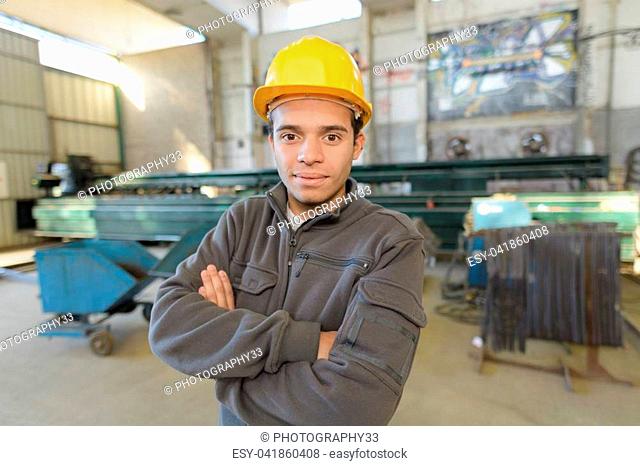industrial machine operator posing