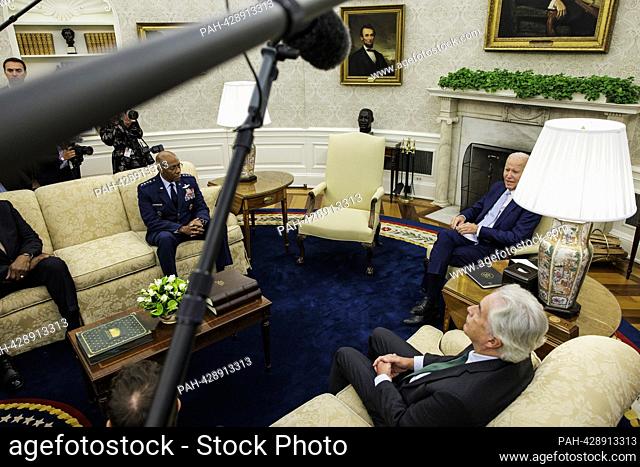 United States President Joe Biden meets with US Air Force General Charles Q. Brown, Jr, Chair, Joint Chiefs of Staff, left, and William J