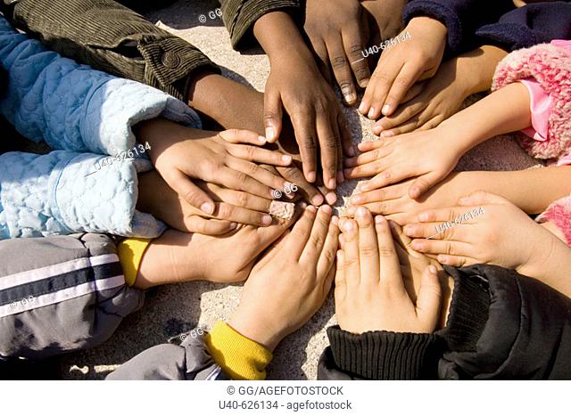 Multi Racial childrens hands