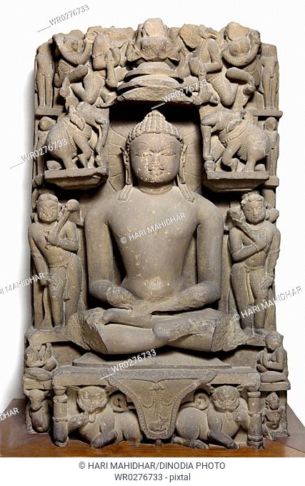 Jain Tirthankar Adinath meditating in sitting posture 11th century AD , Kalchurian period found at Jabalpur district , Madhya Pradesh , India