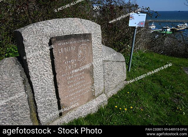 18 April 2023, Mecklenburg-Western Pomerania, Sassnitz: A memorial stone to Vladimir Ilyich Lenin made of red granite stands in the urban area of the town of...