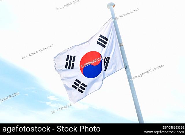 Korean flag with wind on white cloud with blue in the edge