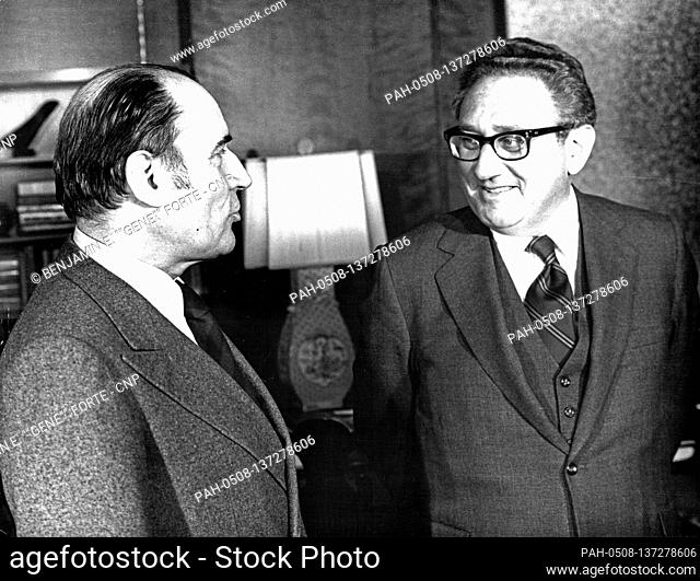 United States Secretary of State Henry Kissinger, right, and French Socialist leader Francois Mitterrand, left meet in the Secretary’s office at the State...