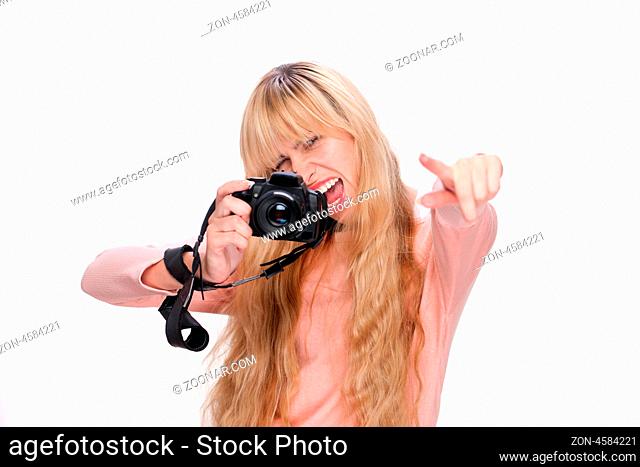 Photographer with digital photo camera on white background