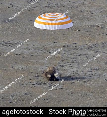 The Soyuz MS-19 spacecraft is seen as it lands in a remote area near the town of Zhezkazgan, Kazakhstan with Expedition 66 crew members Mark Vande Hei of NASA