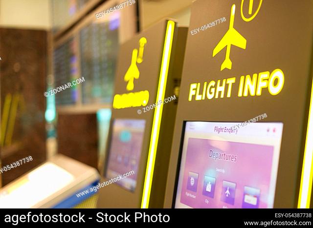 digital screen with flight information in airport