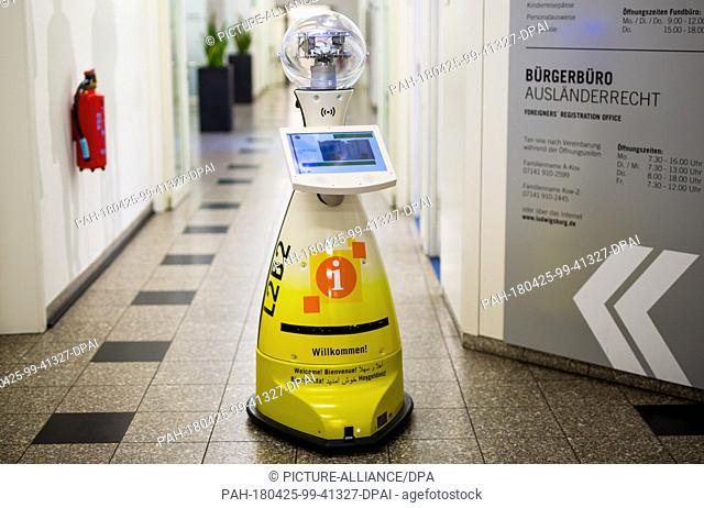 25 April 2018, Germany, Ludwigsburg: The service robot ""L2B2"" drives through a hallway in the local city office during its presentation by the city of...