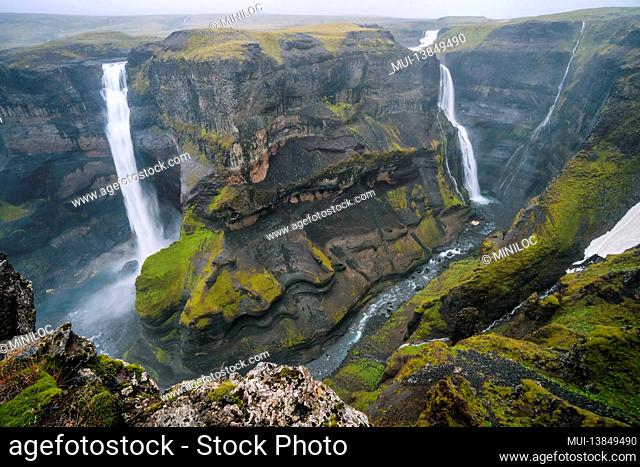 Haifoss, Iceland second highest waterfall and Garni waterfall in background fallen into deep canyon. Travel to Iceland. Beauty of nature concept background