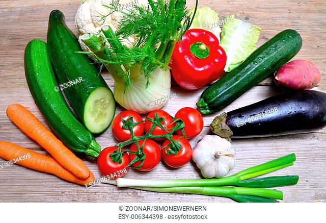 fresh vegetables on wooden board