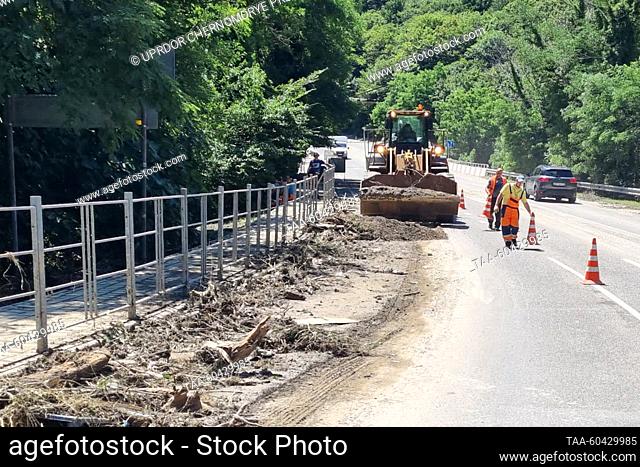 RUSSIA, KRASNODAR REGION - JULY 13, 2023: Cleaning up the A-147 highway after heavy rains. Since the evening of July 11, Tuapse District has seen three months'...
