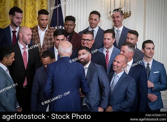 United States President Joe Biden greets members of the Houston Astros in the East Room of the White House to honor their 2022 World Series victory