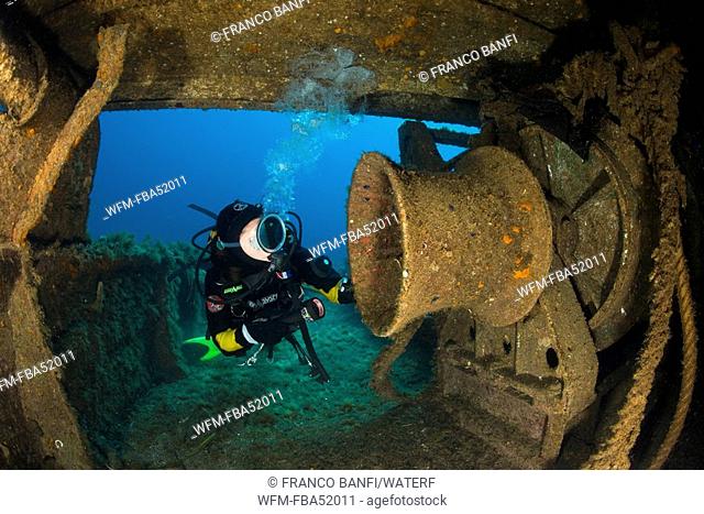 Scuba Diver inside Wreck of Cala Tramontana, Pantelleria Island, Mediterranean Sea, Italy
