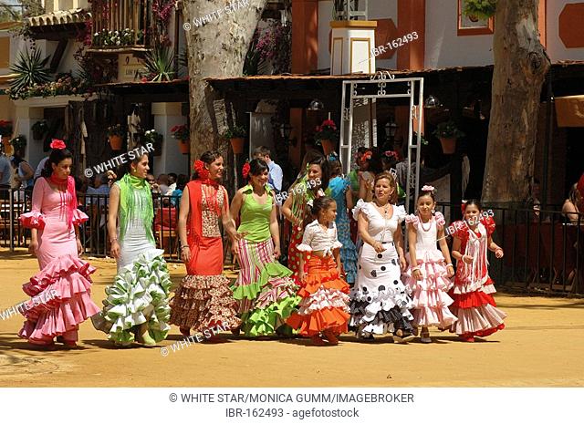 Girls in traje de gitana , Feria de Caballo , Jerez de la Frontera , Cadiz , Andalusia , Spain , Europe
