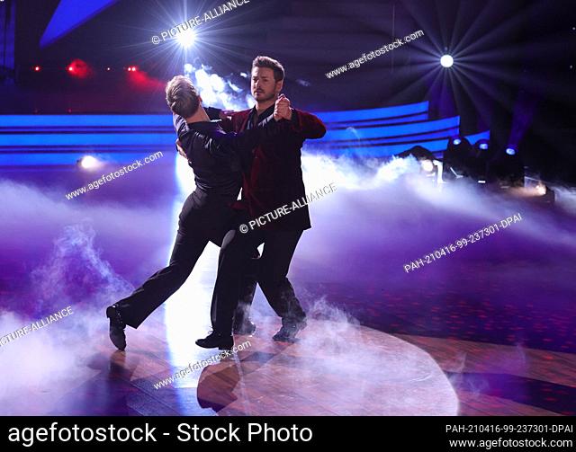 16 April 2021, North Rhine-Westphalia, Cologne: Nicolas Puschmann and Vadim Garbuzov dance a Slow Waltz to ""At This Moment"" in the sixth round of the RTL...