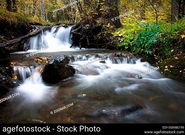 River with small waterfalls in Altai mountains, Russia