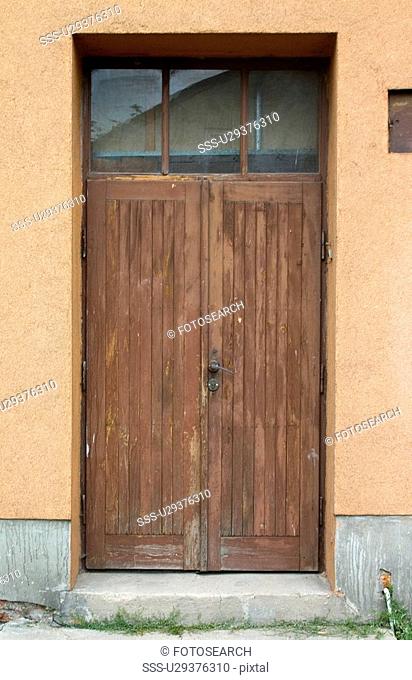 Wood door with glass transom, Rawa Mazowiecka, Central Poland