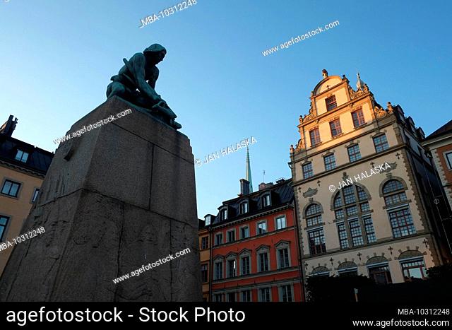 Statue of a man with a crossbow, Gamla Stan in Stockholm, Sweden