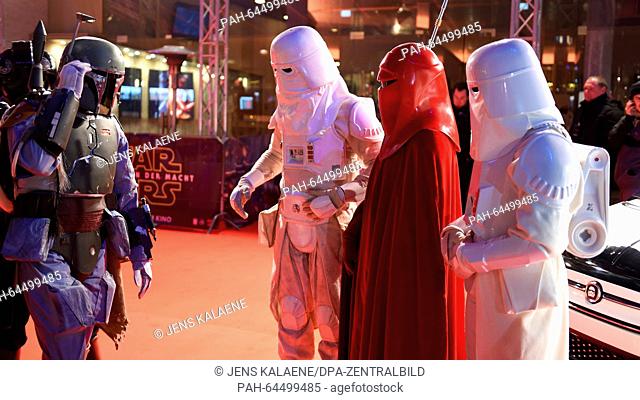 Dressed up fans in Star Wars costumes wait on the red carpet at the Zoo Palast in Berlin, Germany, 16 December 2015. This evening the premiere of the new...